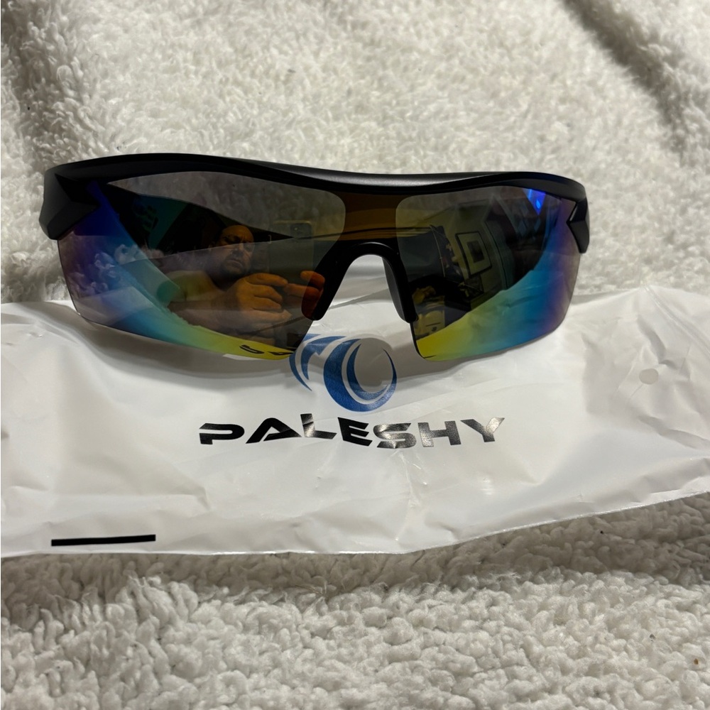 Paleshy Reflective Sports Sunglasses with black frames. New